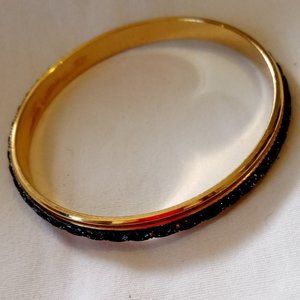 Monet Women's Bangle 8.5 Inches Around Marked Black and Gold Color Pre-Owned